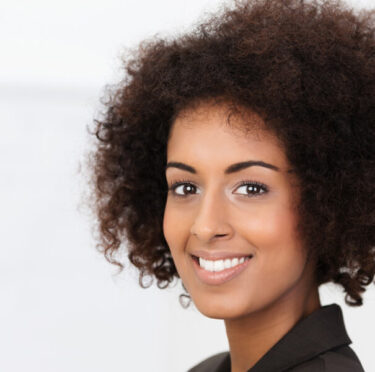 How do dental implants work with your existing teeth